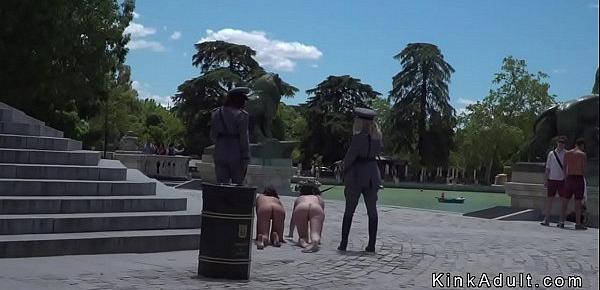 Two naked slave made to crawl in public